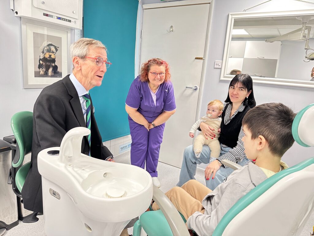 Principal Dentist Dr. Liana with Dr. John Flutter at Optident Dental Clinic in Colchester, discussing Myobrace treatment and early orthodontic care.